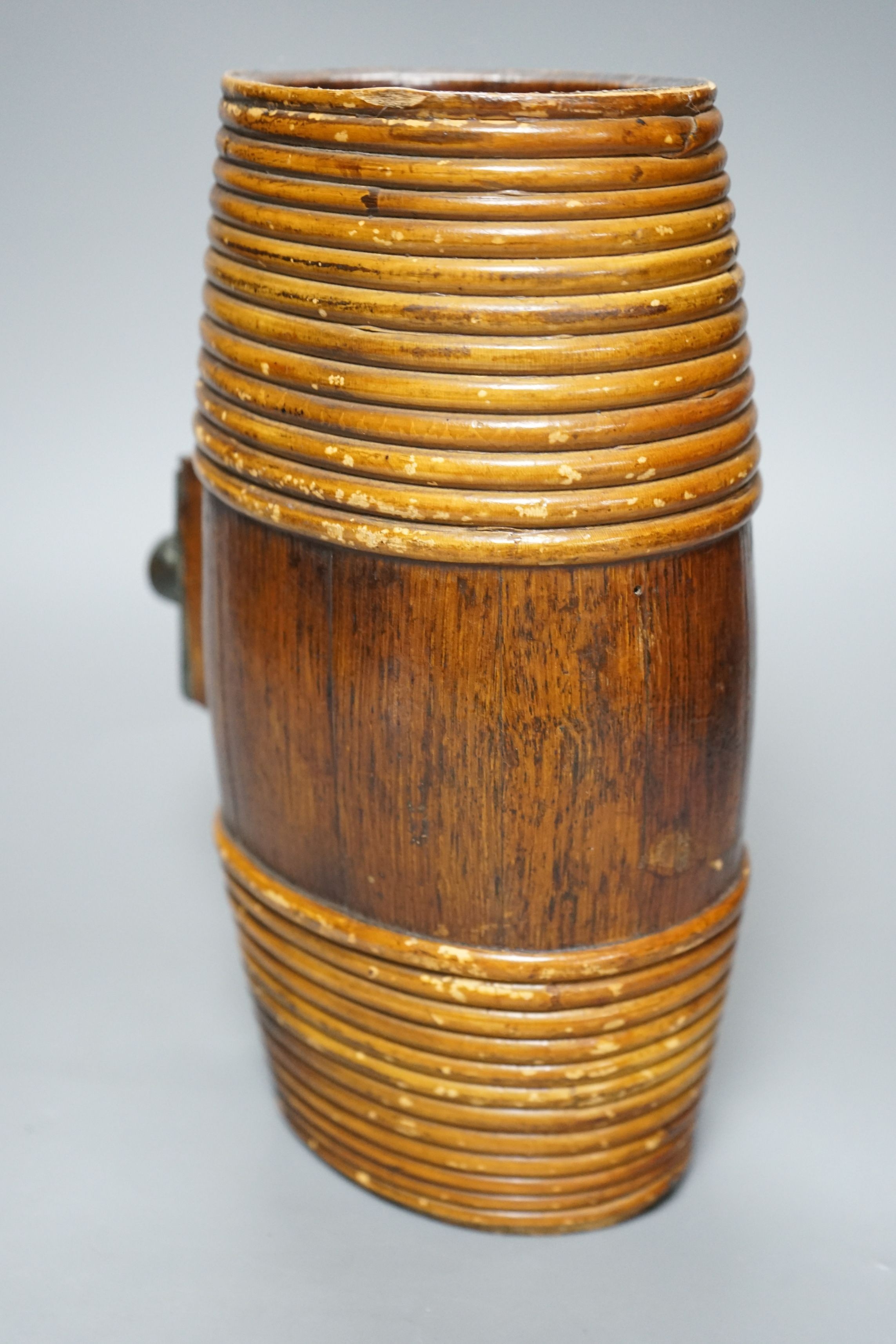 A wooden cider costrel and a pair of brass scissors 27cms high
